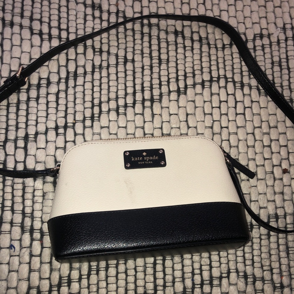 Créame and black Kate spade purse
